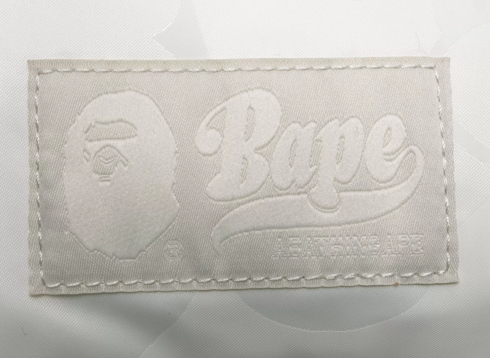 A Bathing Ape Tonal Solid Camo Shoulder Bag in Ivory