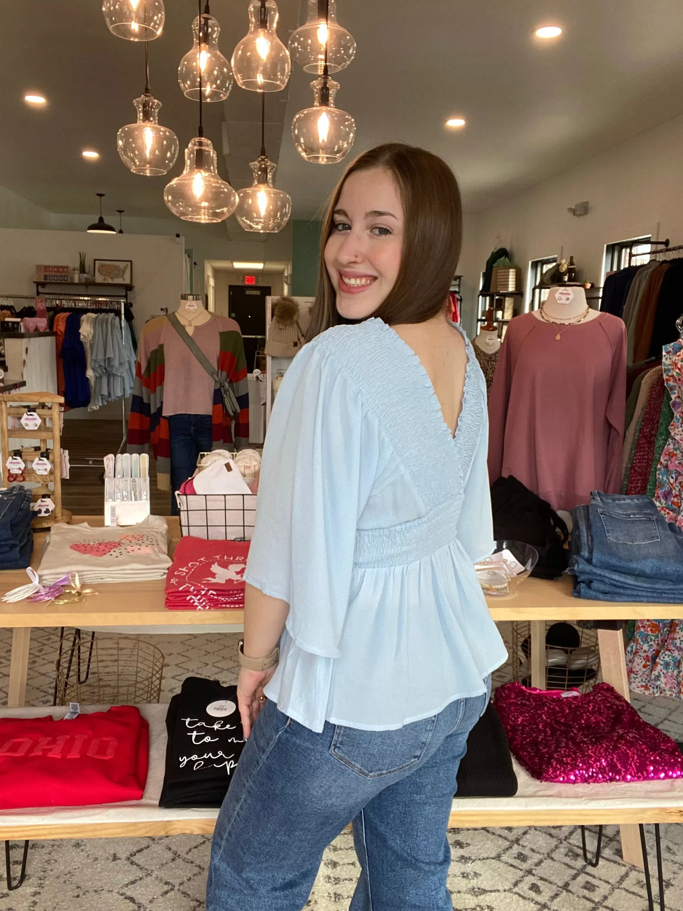 Smocked Surplice Peplum Blouse - Baby Blue